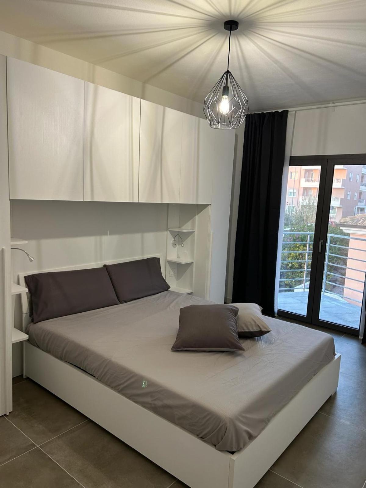 Family House Apartment Porto Torres Bagian luar foto