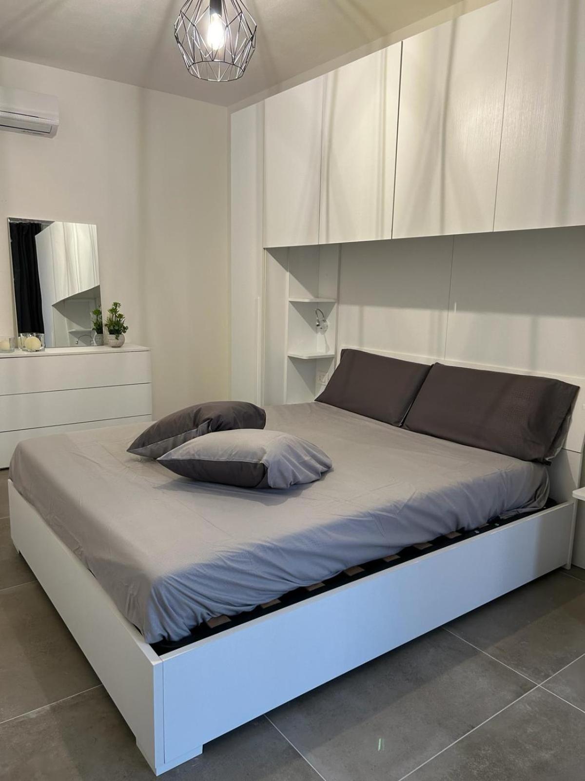 Family House Apartment Porto Torres Bagian luar foto
