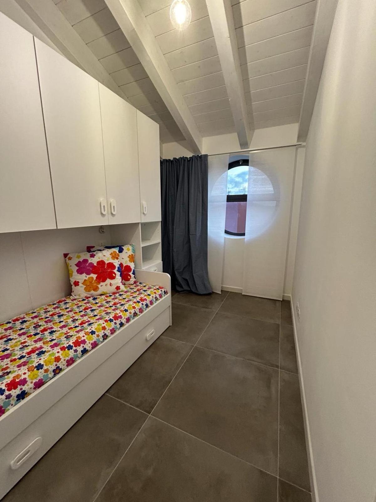 Family House Apartment Porto Torres Bagian luar foto
