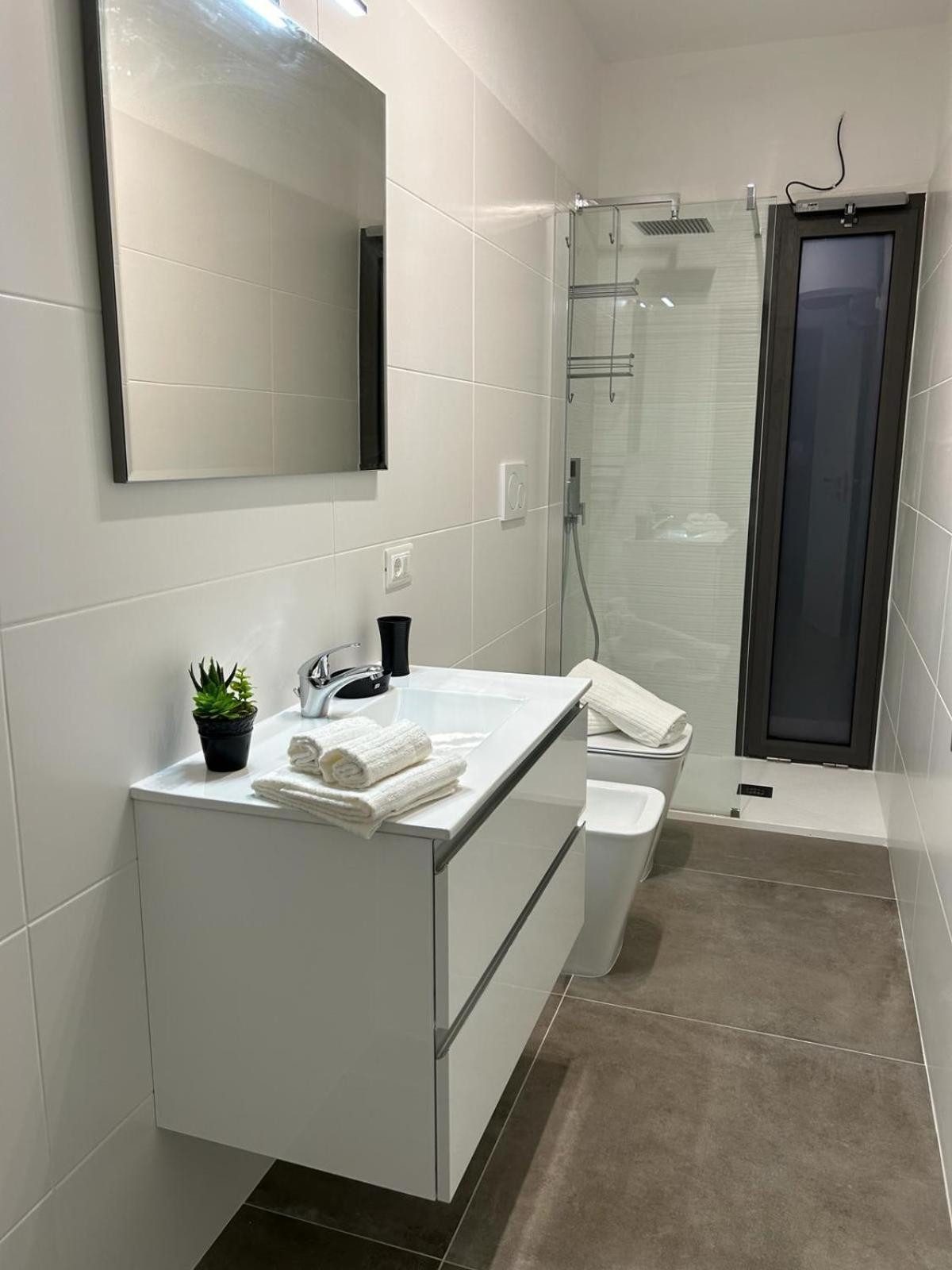 Family House Apartment Porto Torres Bagian luar foto