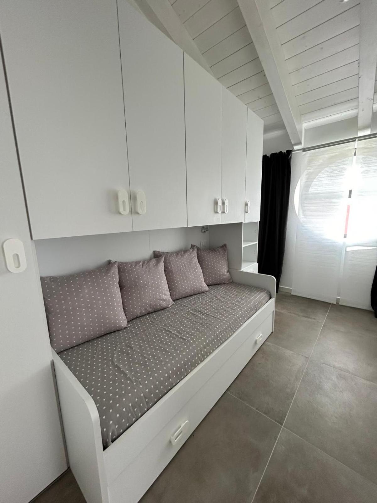 Family House Apartment Porto Torres Bagian luar foto